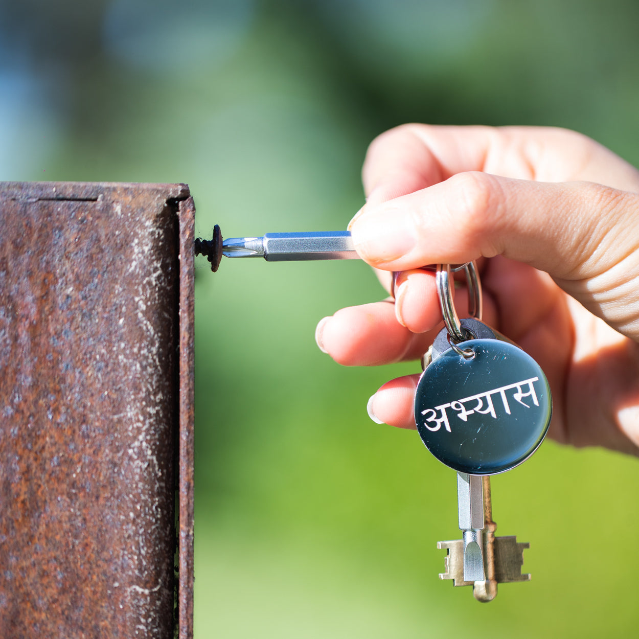 Abhyāsa Screw Driver Keychain